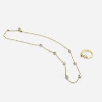 A Contemporary Gold and Diamond Ring and Necklace