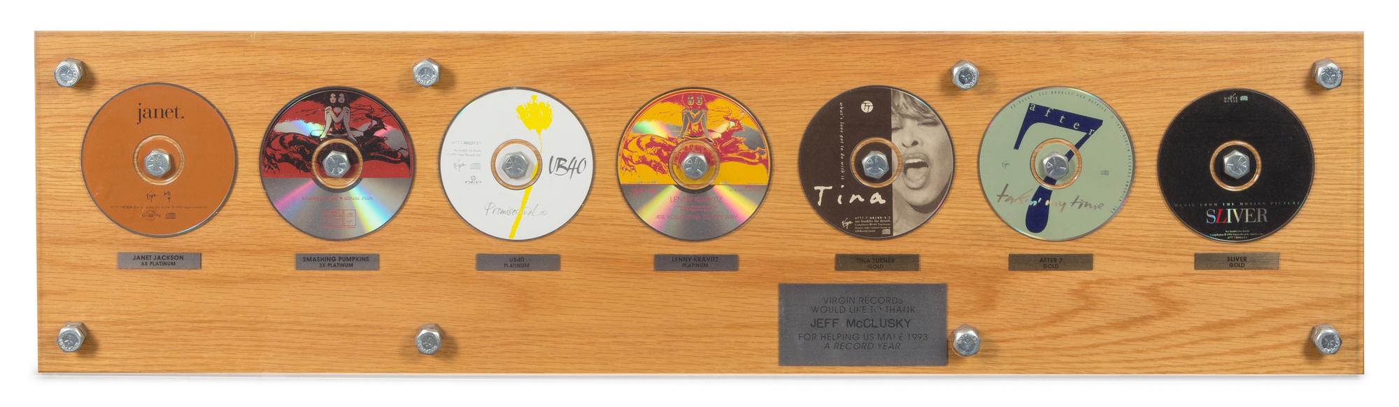 A Virgin Records 1993 Commemorative Records Plaque 10 1/2 x 40 inches.