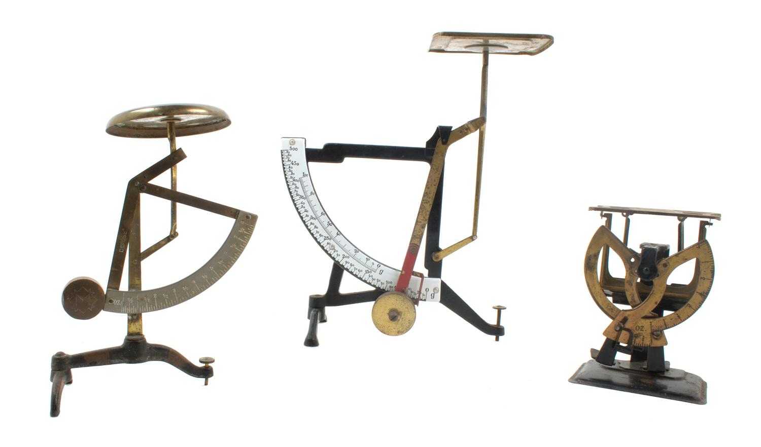 A Group of Three Postal Scales Height of tallest 10 1/2 inches.