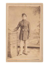 [CIVIL WAR]. BALL, J. P., photographer. CDV of a young soldier in a studio setting. Cincinnati, OH.