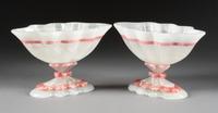 A Pair of Carved Rhodochrosite and Agate Tazze Height 3 3/4 x width 6 1/4 inches.