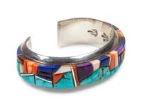 Sterling silver cuff bracelet with turquoise, lapis, sugilite, coral, and shell mosaic inlay