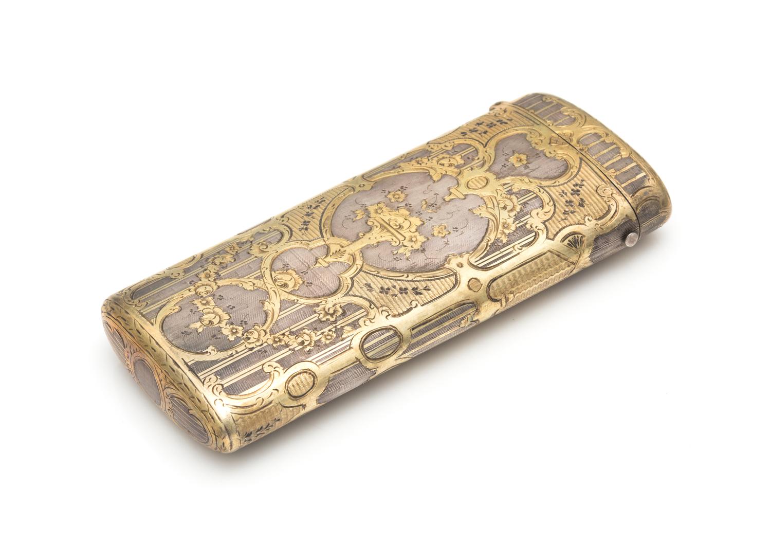 A French Silver-Gilt Spectacles Case, Maker's Mark Obscured, Late 19th/Early 20th Century, the case worked to show floral sprays on an