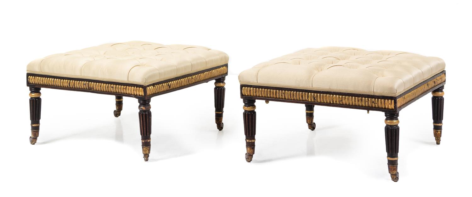 A Pair of Regency Ebonized and Parcel Gilt Stools Height 15 x width 26 1/4 x depth 26 1/4 inches. — CIRCA 1815