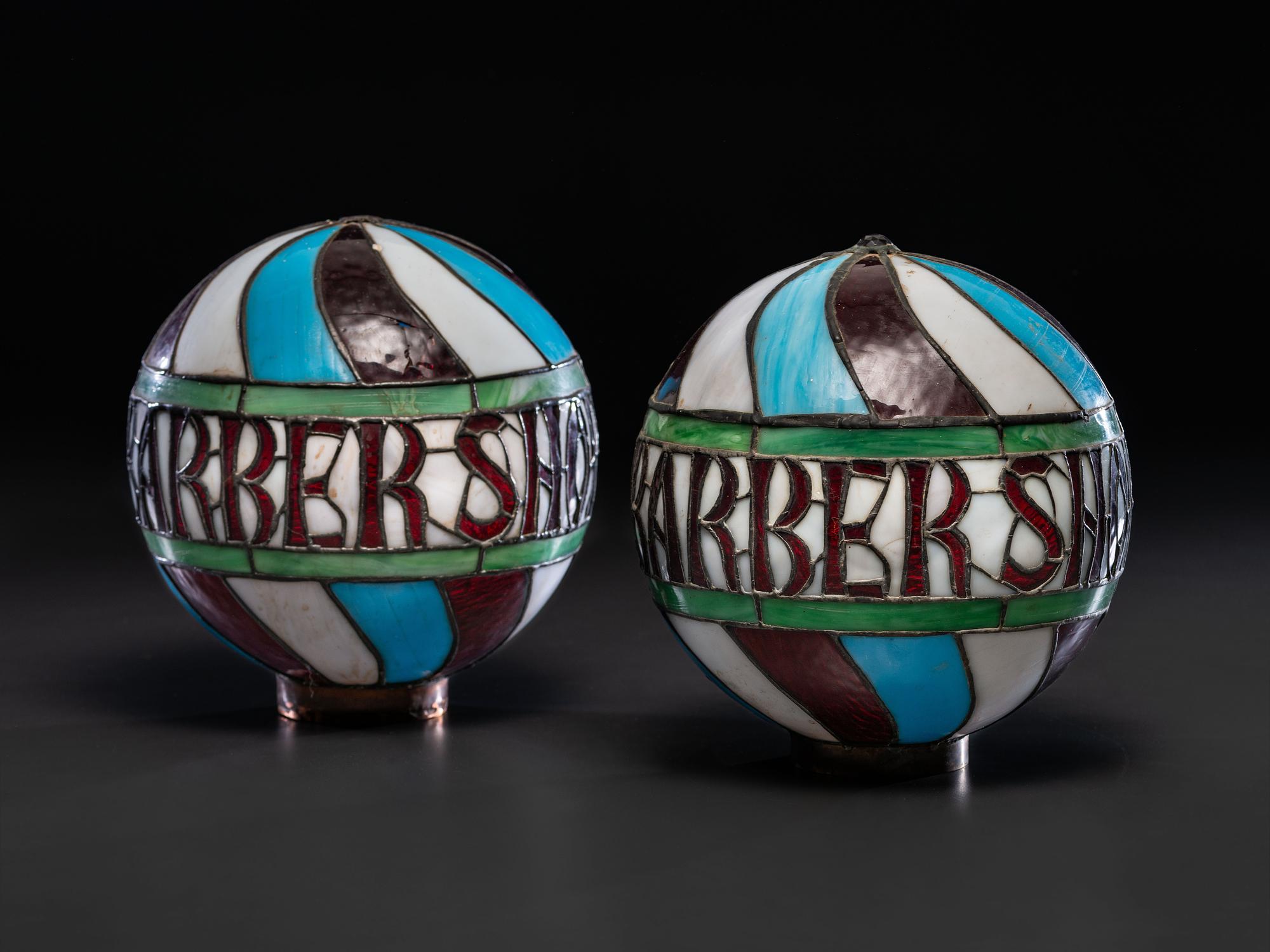 A Pair of Leaded Glass Barber Pole Globes
