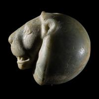 A Mesopotamian Green Stone Seal with a Lion Head