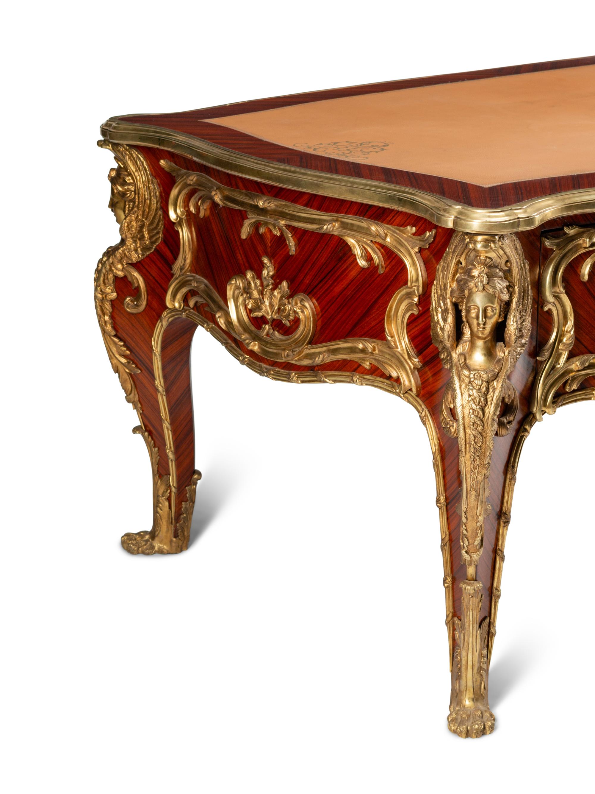 A Louis XV Style Gilt Bronze Mounted Kingwood Bureau Plat