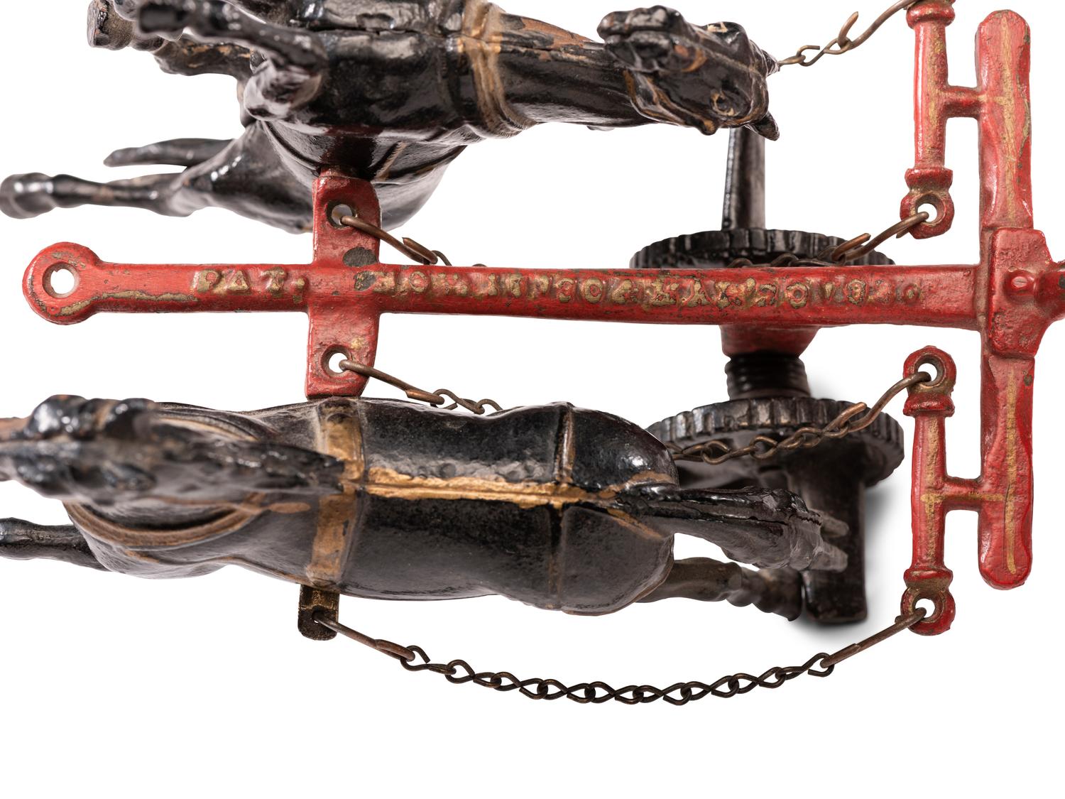 A Carpenter 'Tally Ho' Cast Iron Carriage Toy