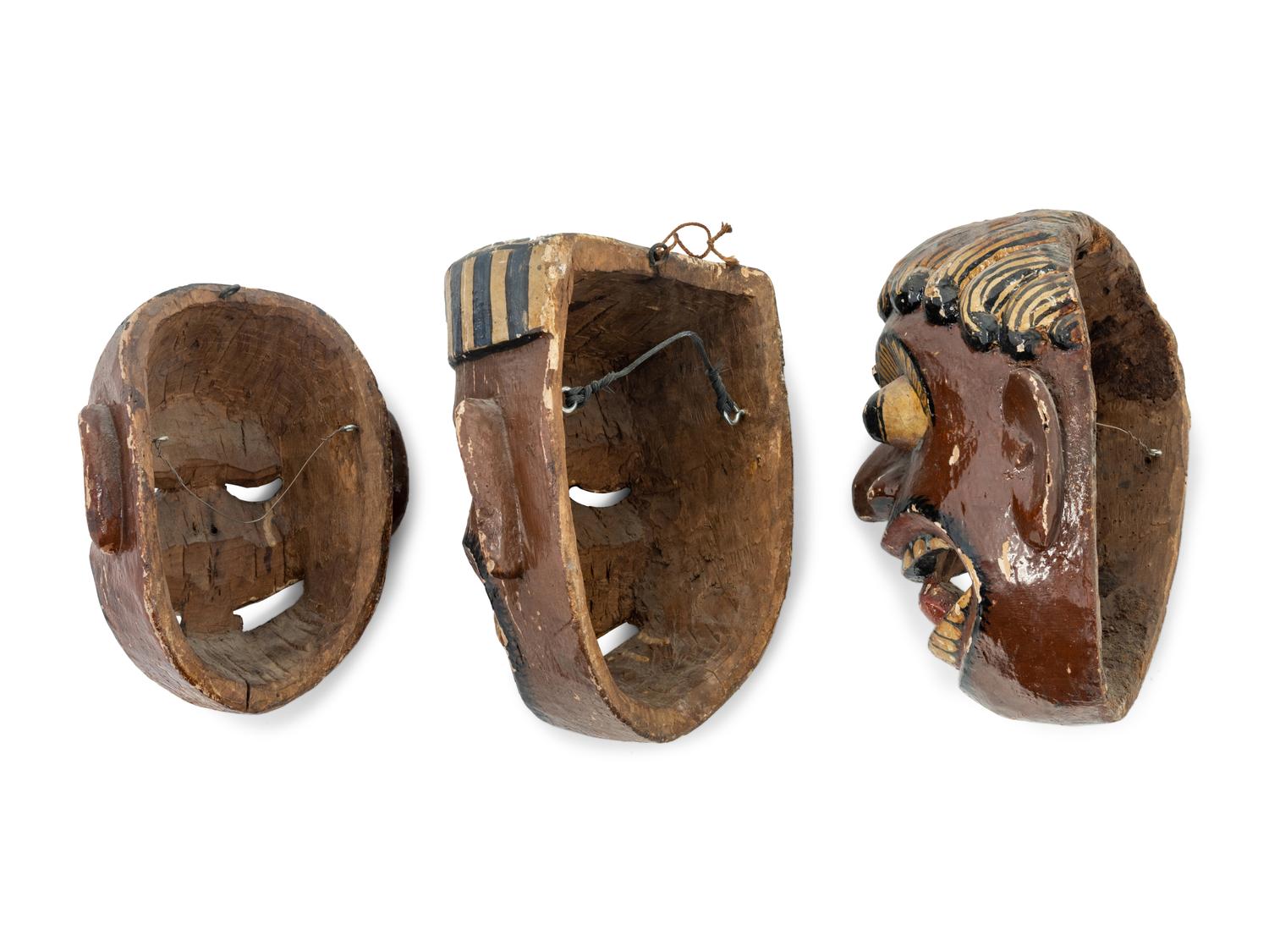 Three Mexican Carved and Polychromed Wood Masks