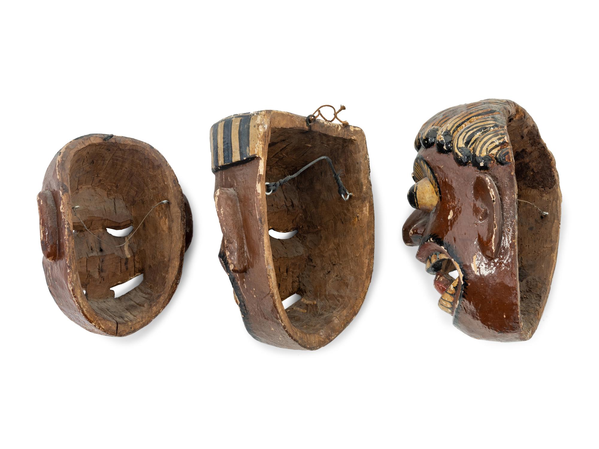 Three Mexican Carved and Polychromed Wood Masks
