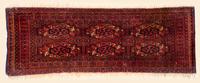 A Bokhara Wool Rug 3 feet 2 inches x 1 foot 1 1/2 inches.