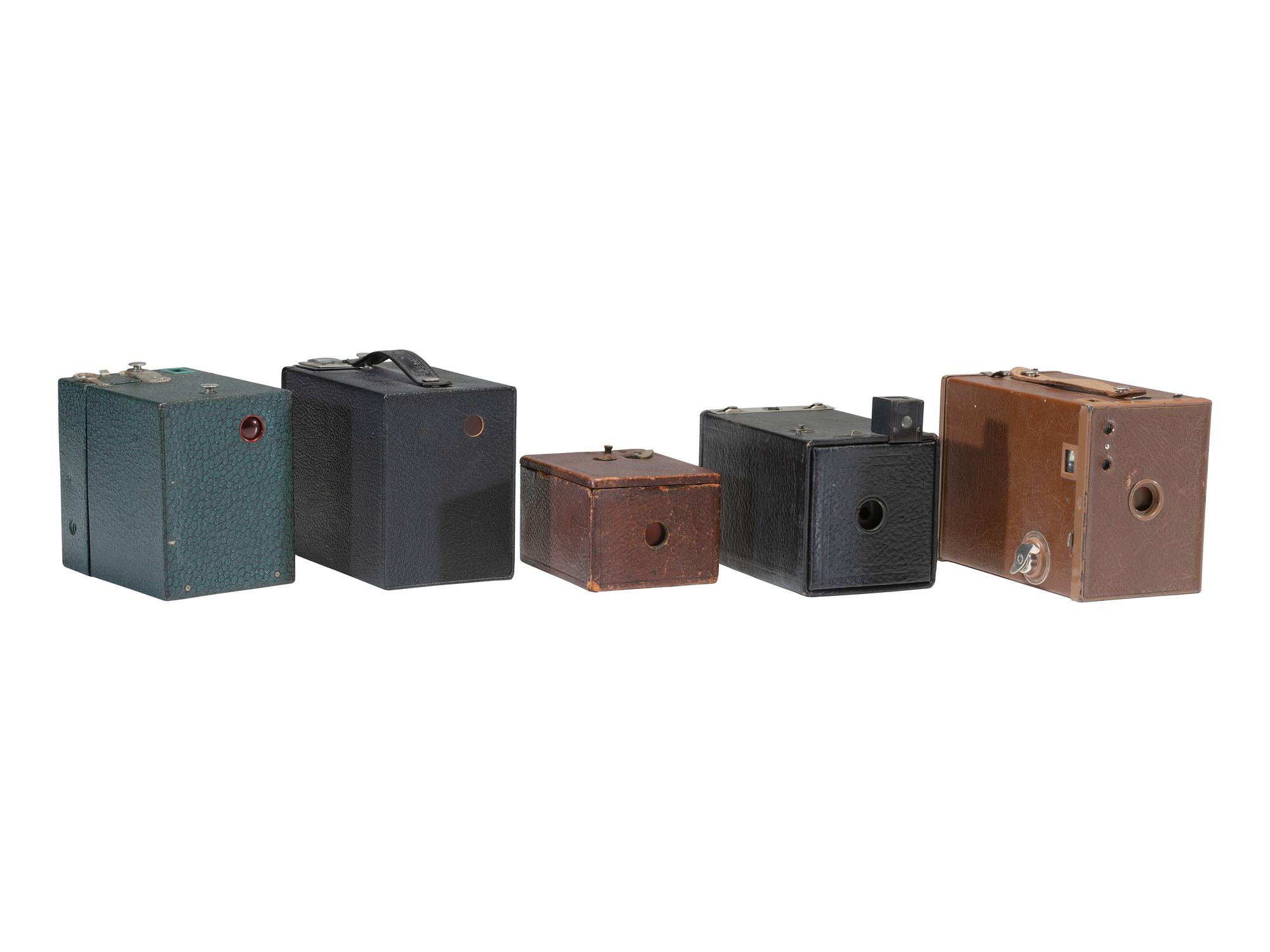 [CAMERAS]. A selection of Kodak cameras, incl. Brownie No. 2 and green Beau Brownie Art Deco camera.