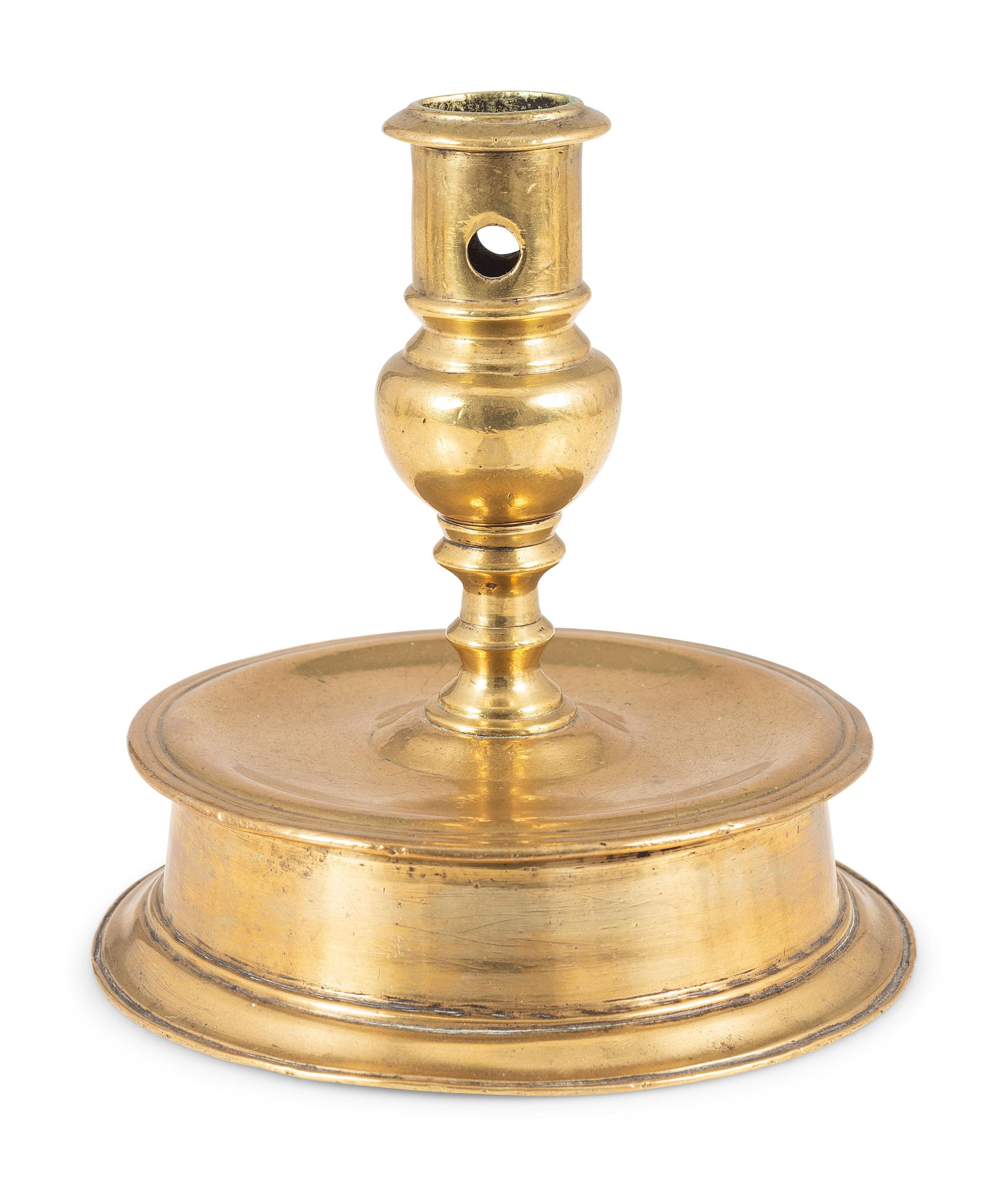 A Continental Cast Brass Capstan Candlestick