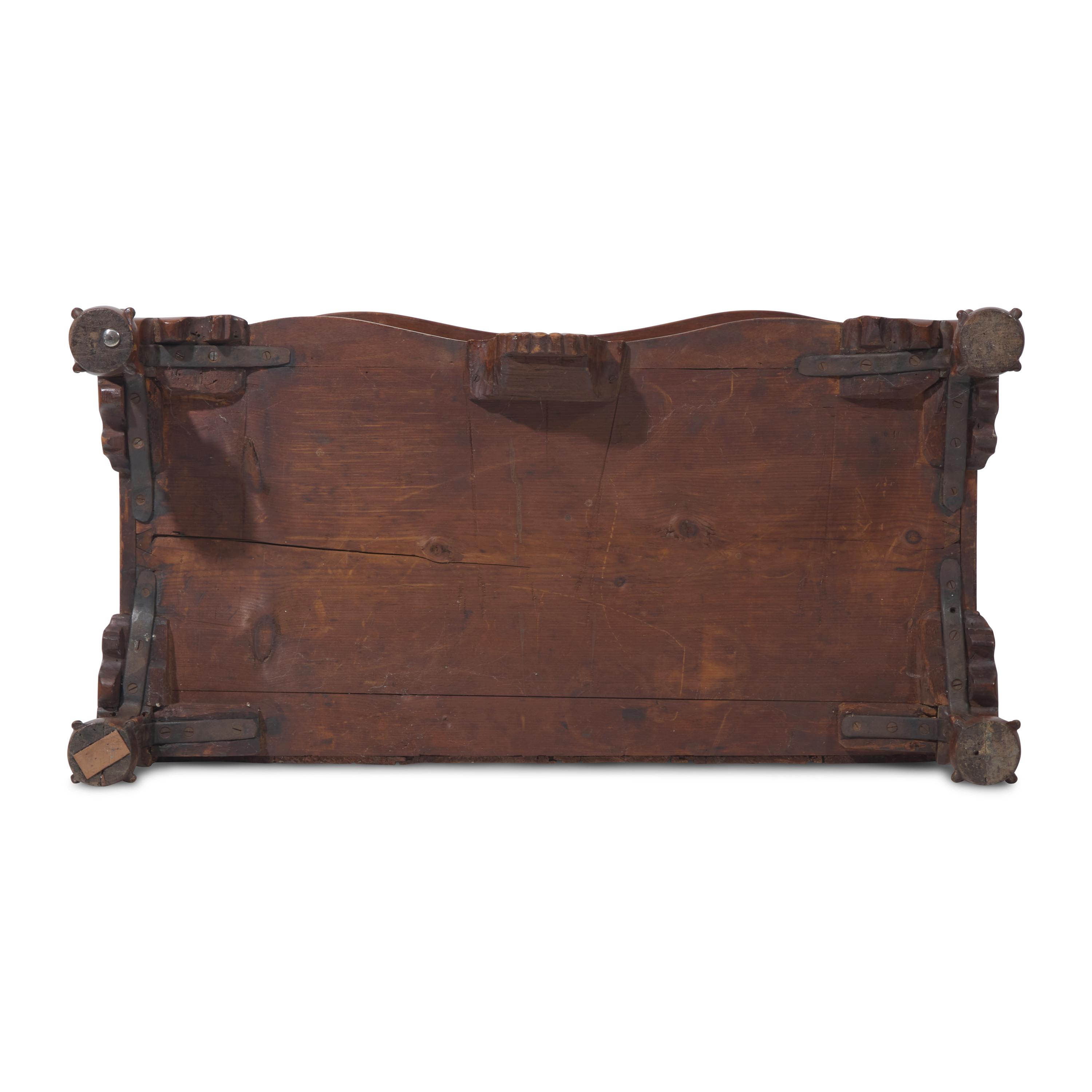 A Chippendale Figured and Shell-Carved Mahogany Reverse-Serpentine Chest of Drawers