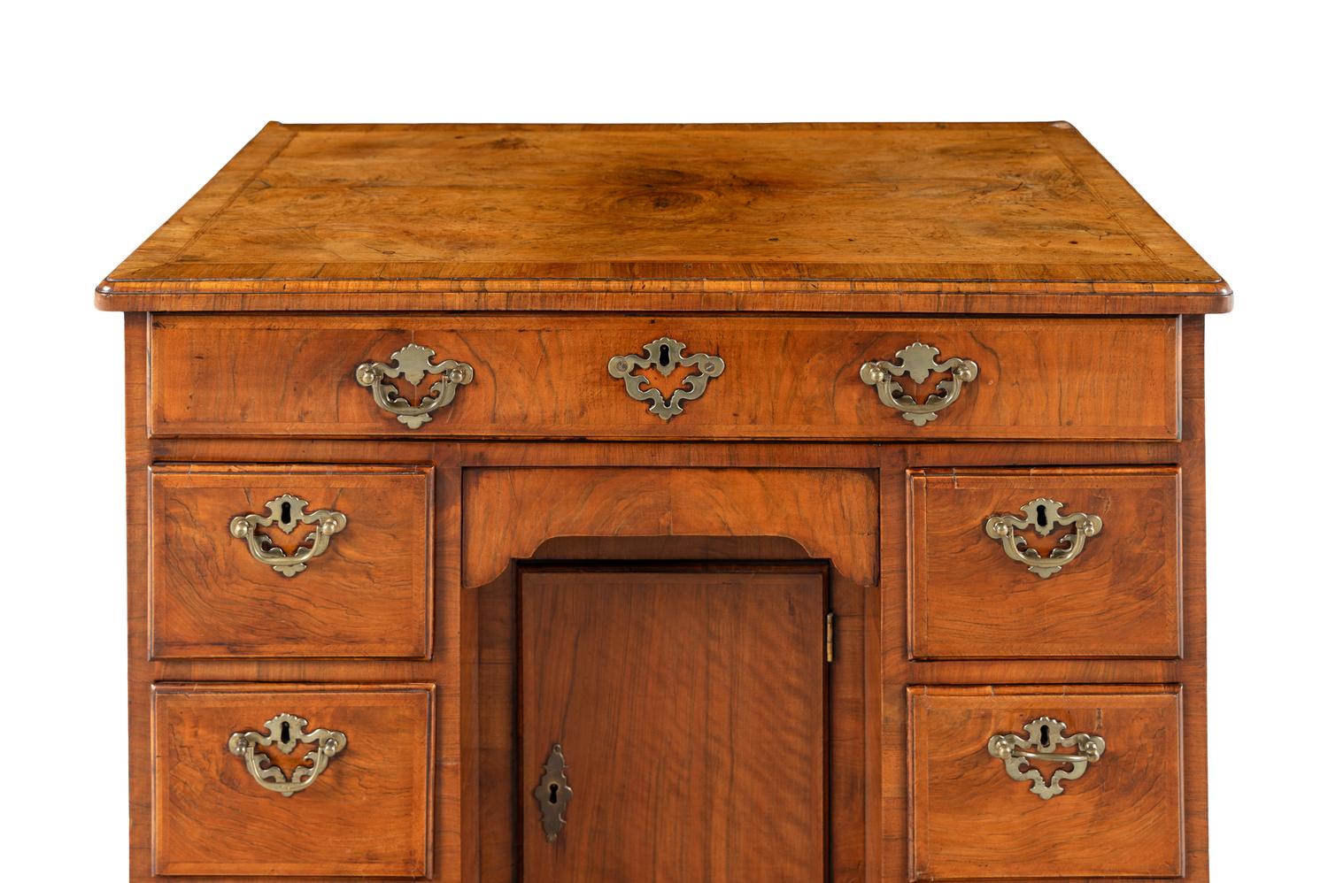A George II Walnut Kneehole Desk