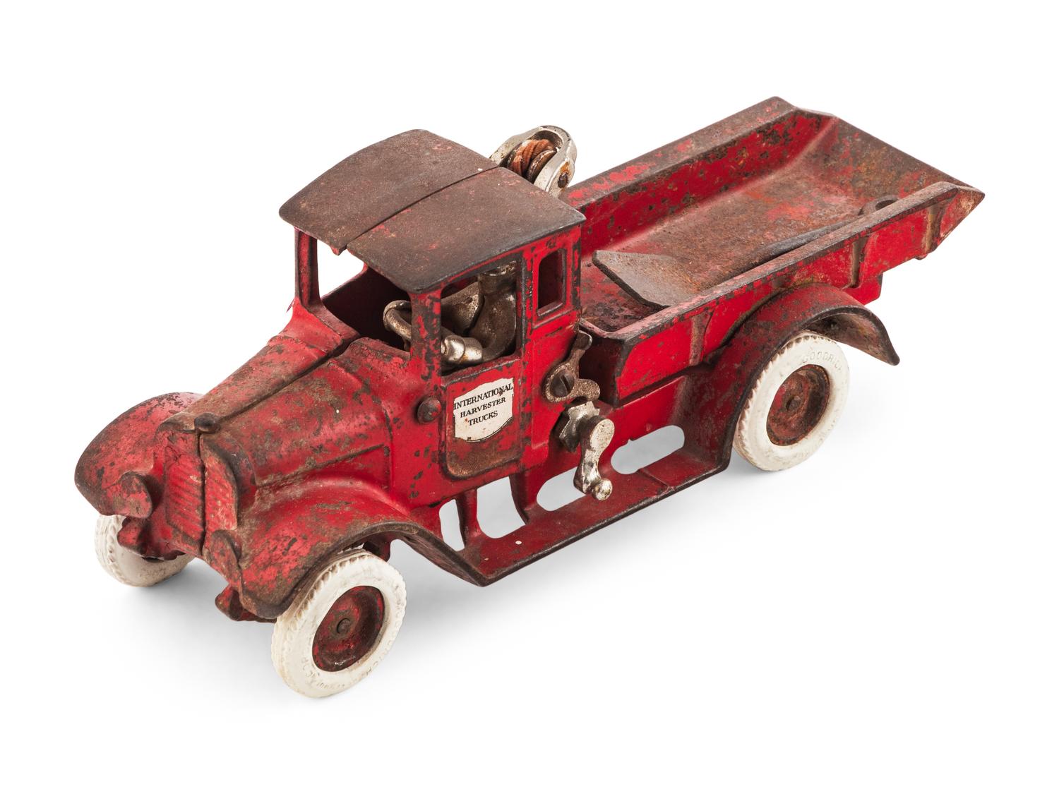 Two Arcade Cast Iron Flat Bed Trucks