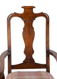 A Set of Six Continental Scroll-Carved Walnut Dining Chairs