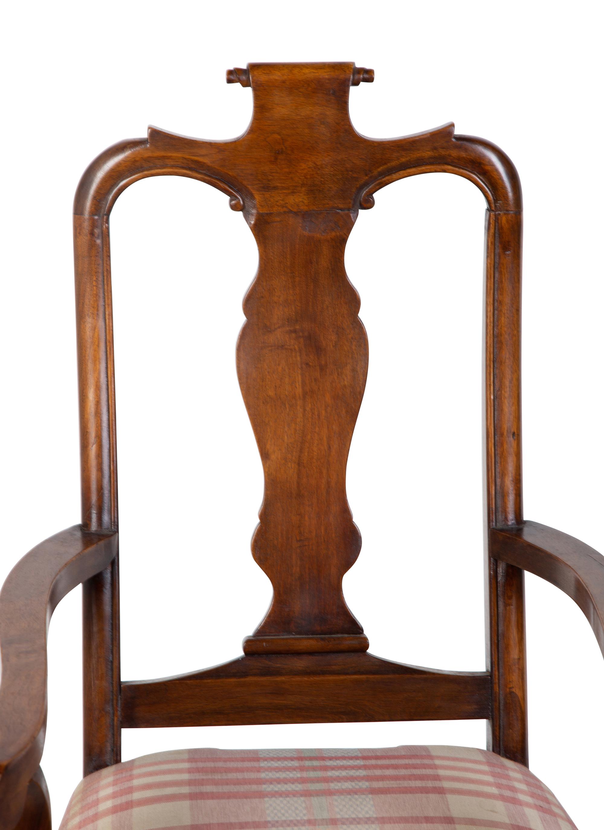 A Set of Six Continental Scroll-Carved Walnut Dining Chairs