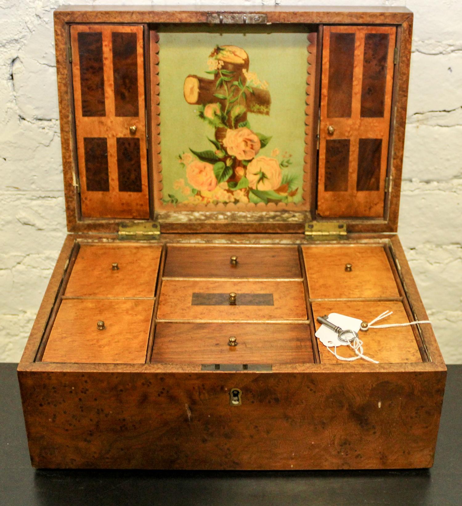 A Wooden Sewing Box. Height 5 1/4 x width 8 x depth 12 inches.