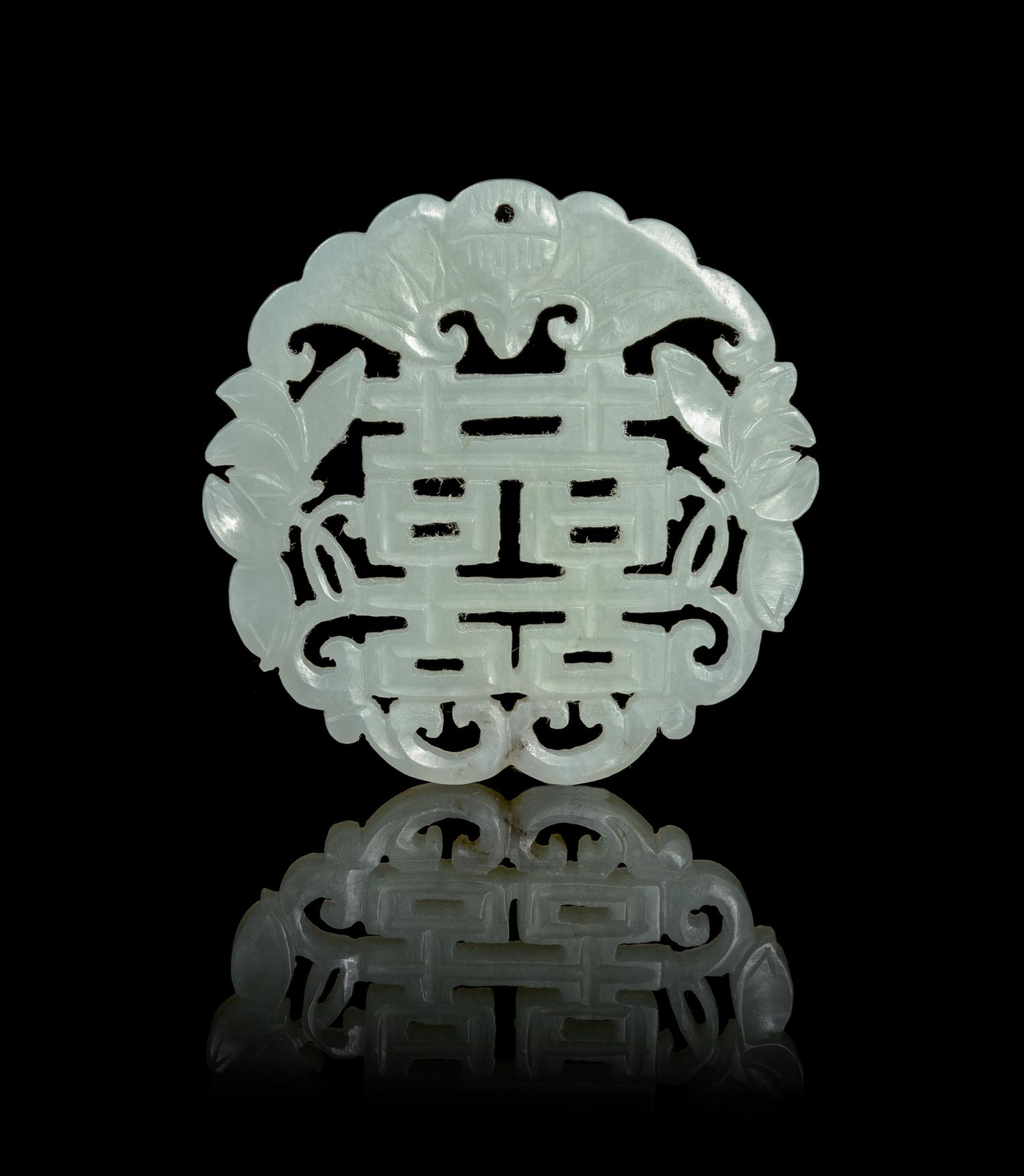 A Pierce Carved Celadon Jade Pendant Height 2 1/8 inches.