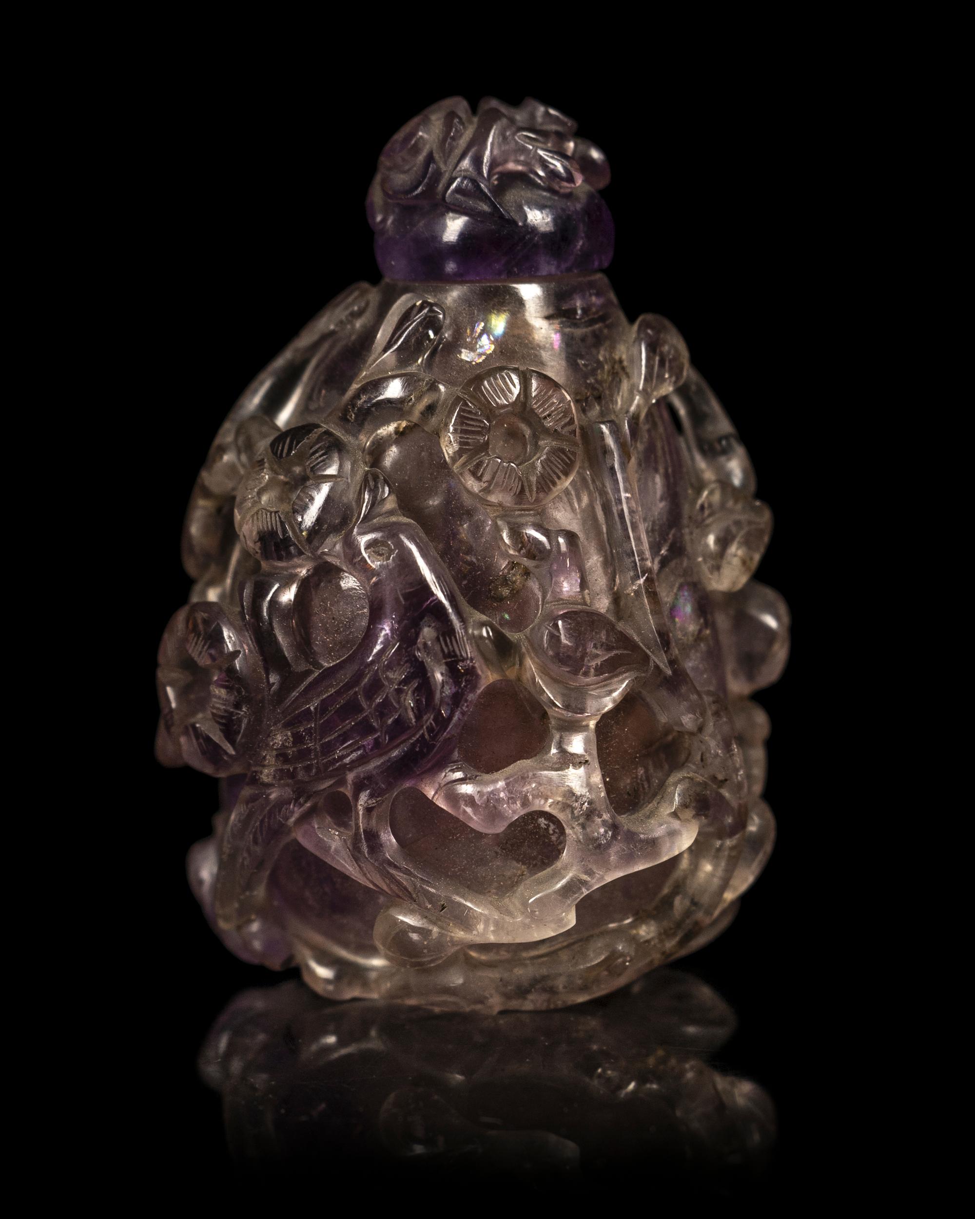Three Chinese Hardstone Snuff Bottles