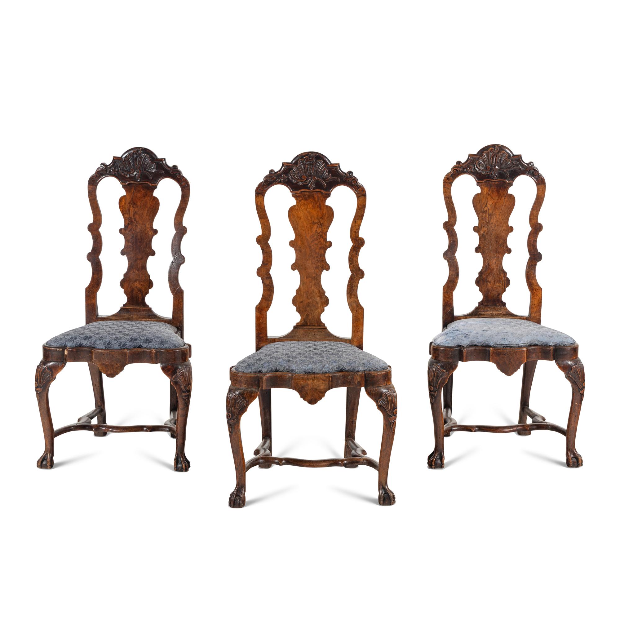 A Set of Three Dutch Carved Walnut Side Chairs