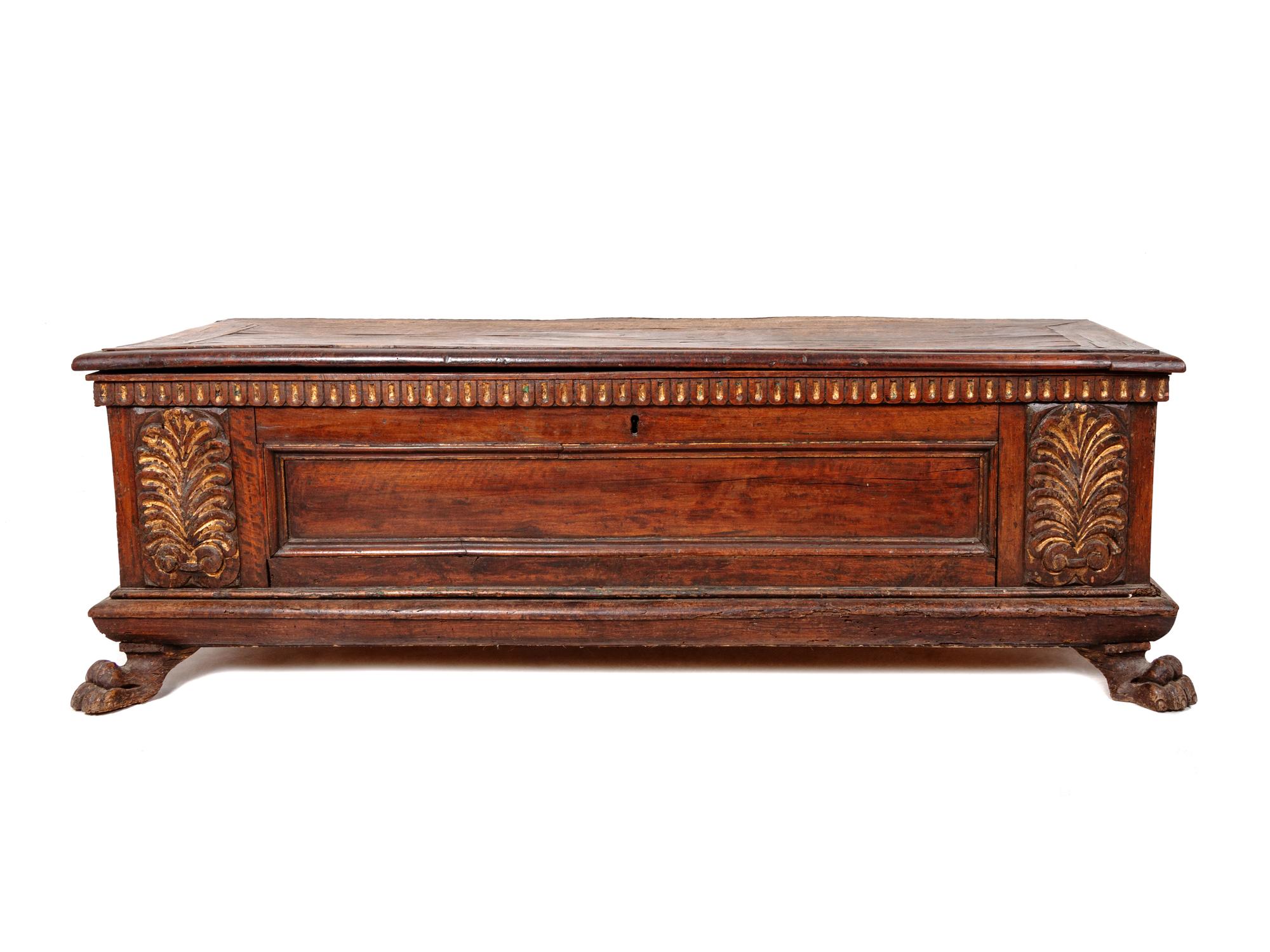 A Spanish Parcel Gilt Carved Walnut Chest