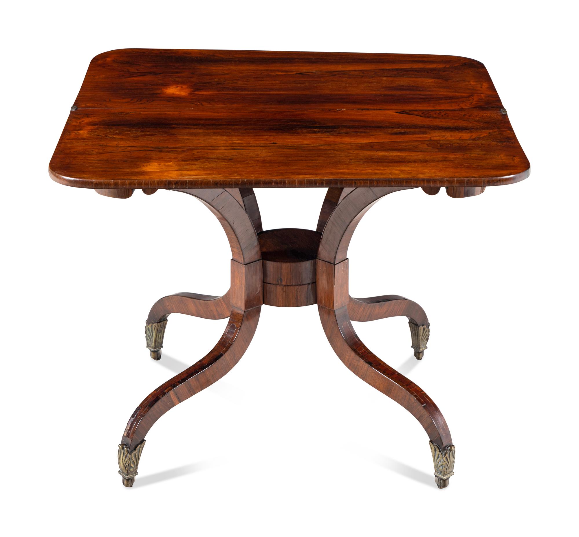 A Regency Rosewood and Mahogany Flip-Top Table
