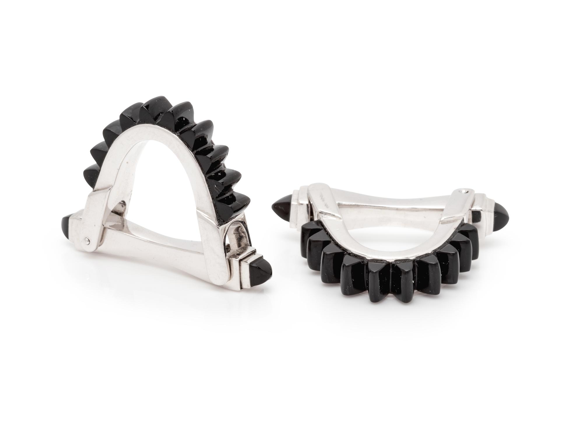 A Pair of White Gold and Onyx Stirrup Cufflinks,