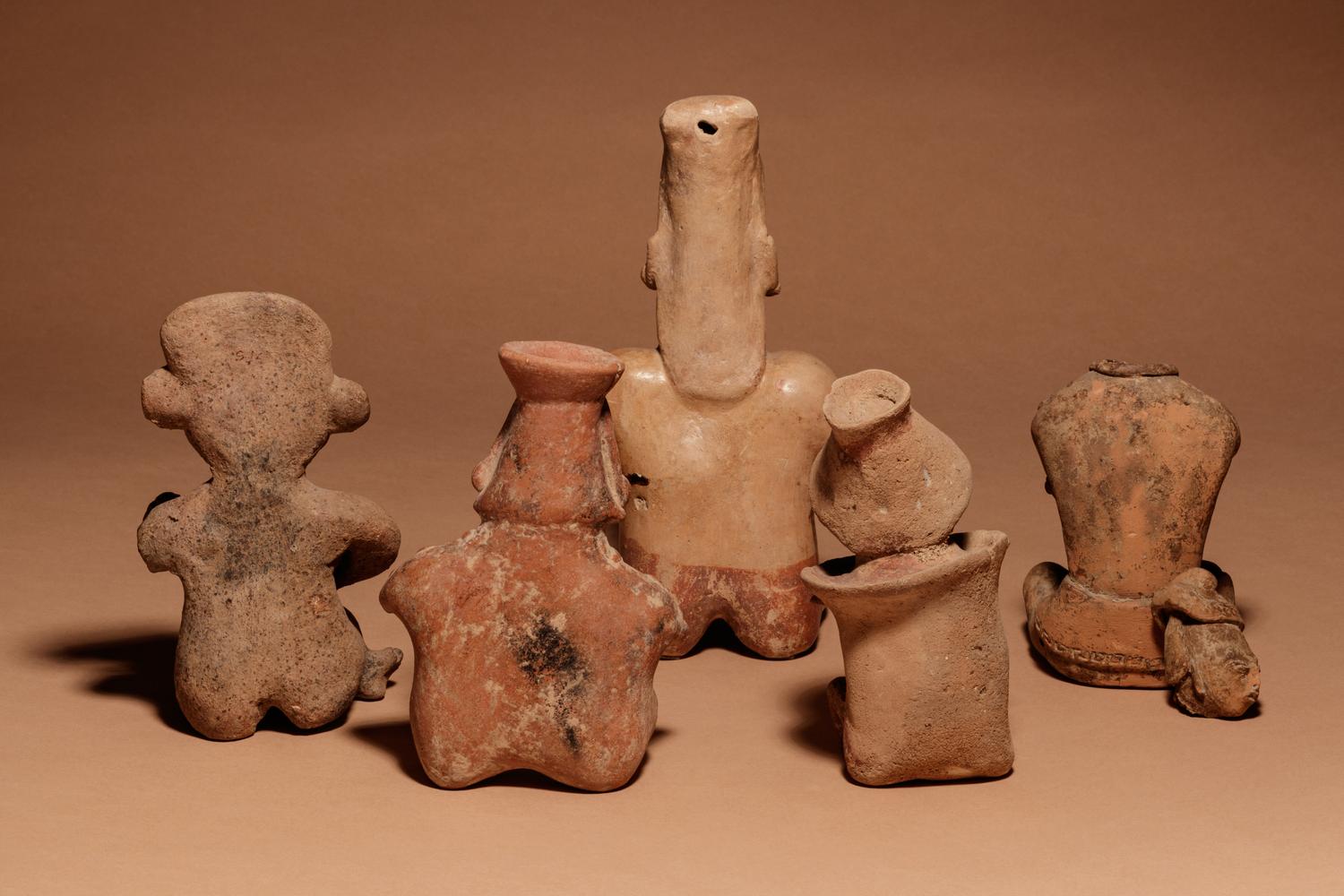 A Group of Five Pre-Columbian Terracotta Seated Figures