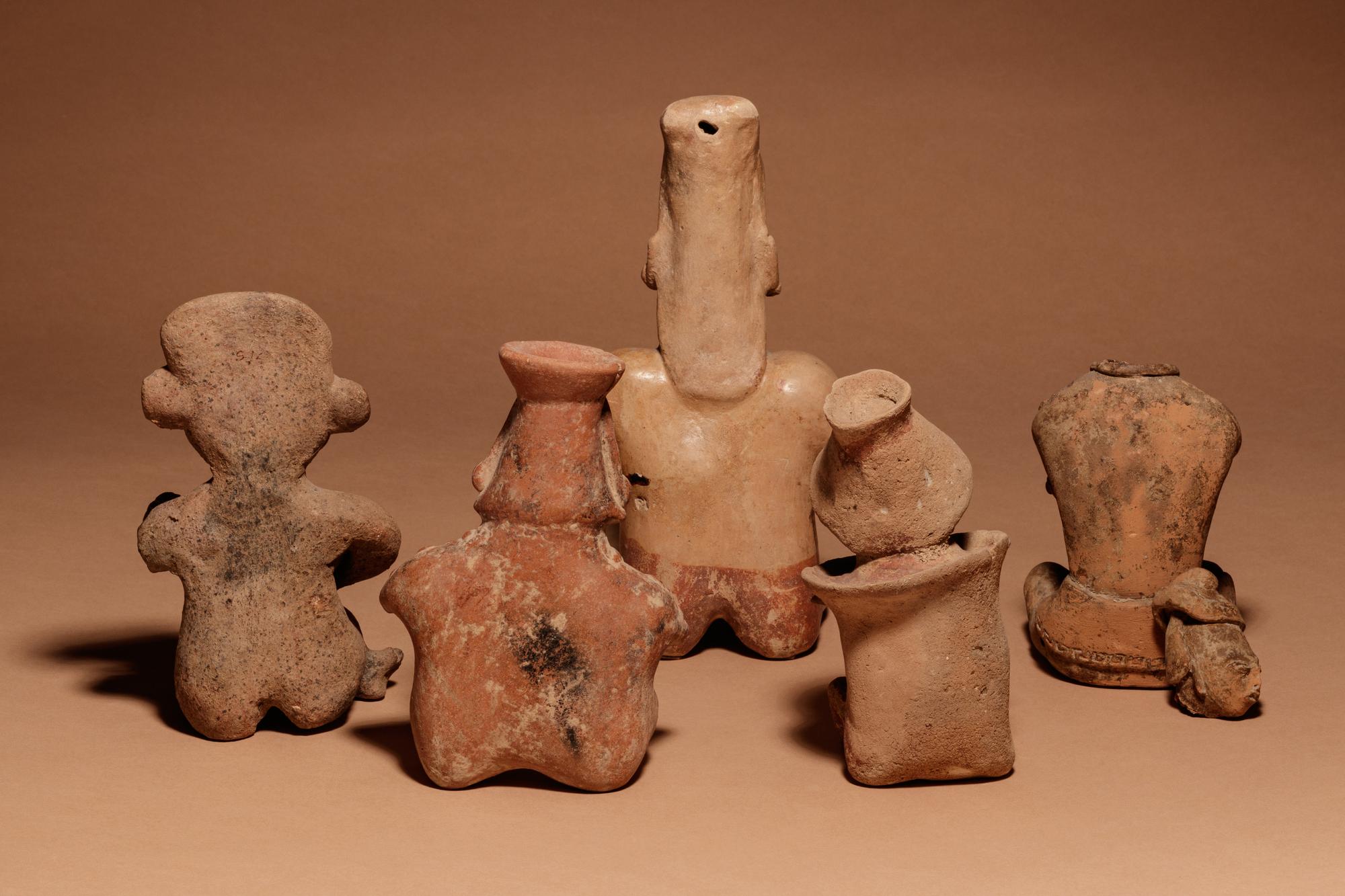 A Group of Five Pre-Columbian Terracotta Seated Figures