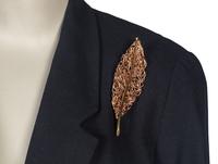 Ildi Marshall Dress and Louis Féraud Suit Accompanied by Three Brooches