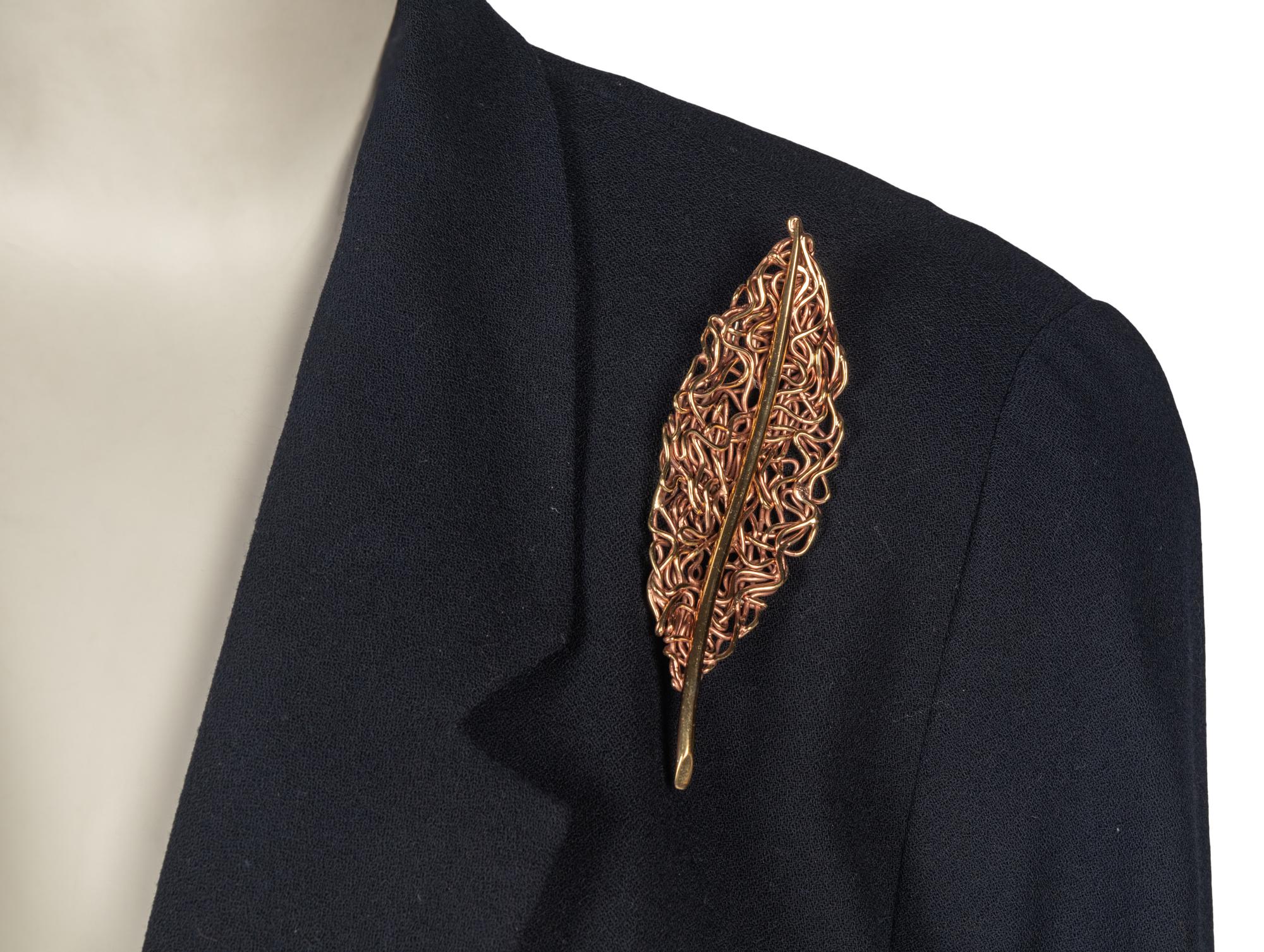 Ildi Marshall Dress and Louis Féraud Suit Accompanied by Three Brooches