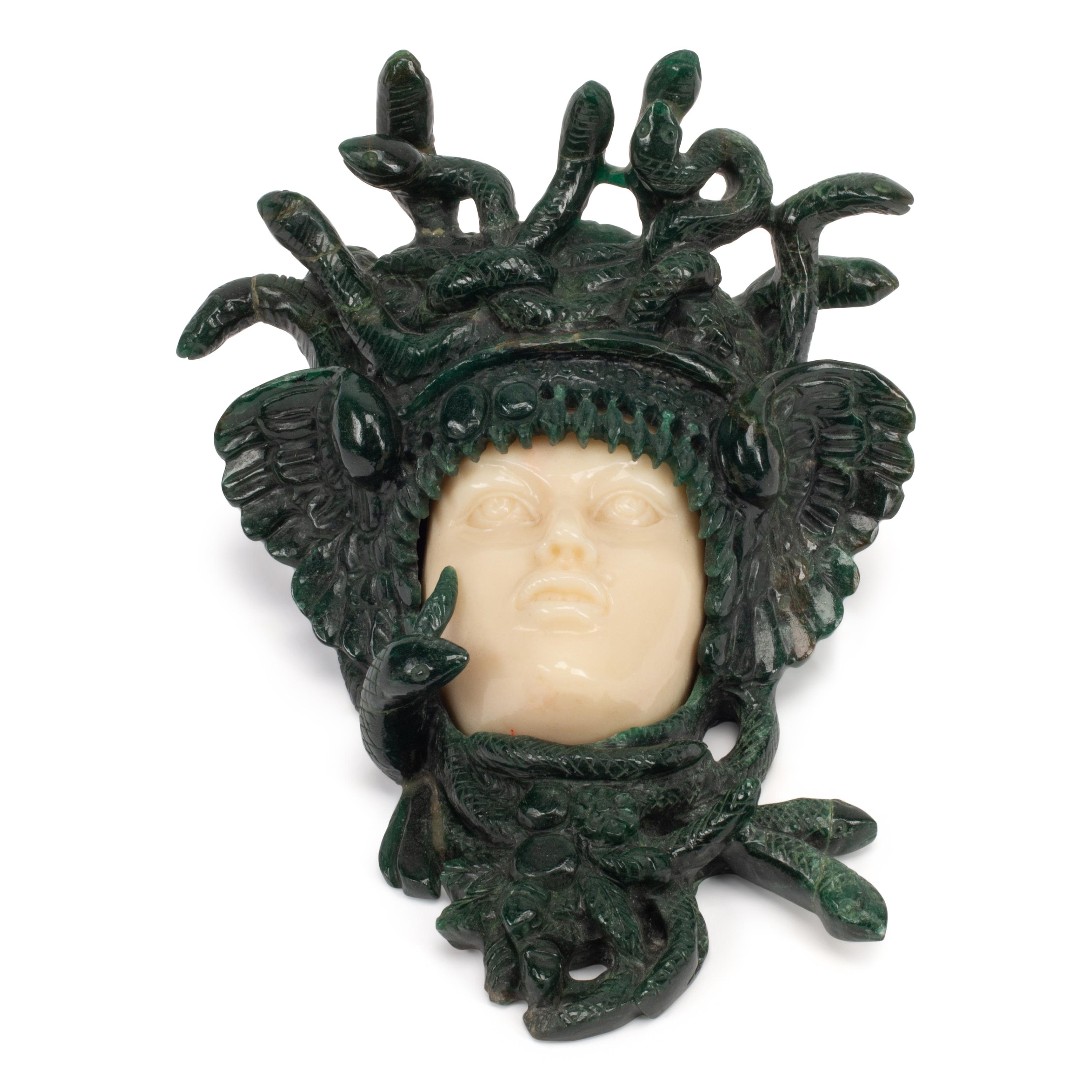 A Carved Green and Yellow Aventurine Medusa Wall Ornament