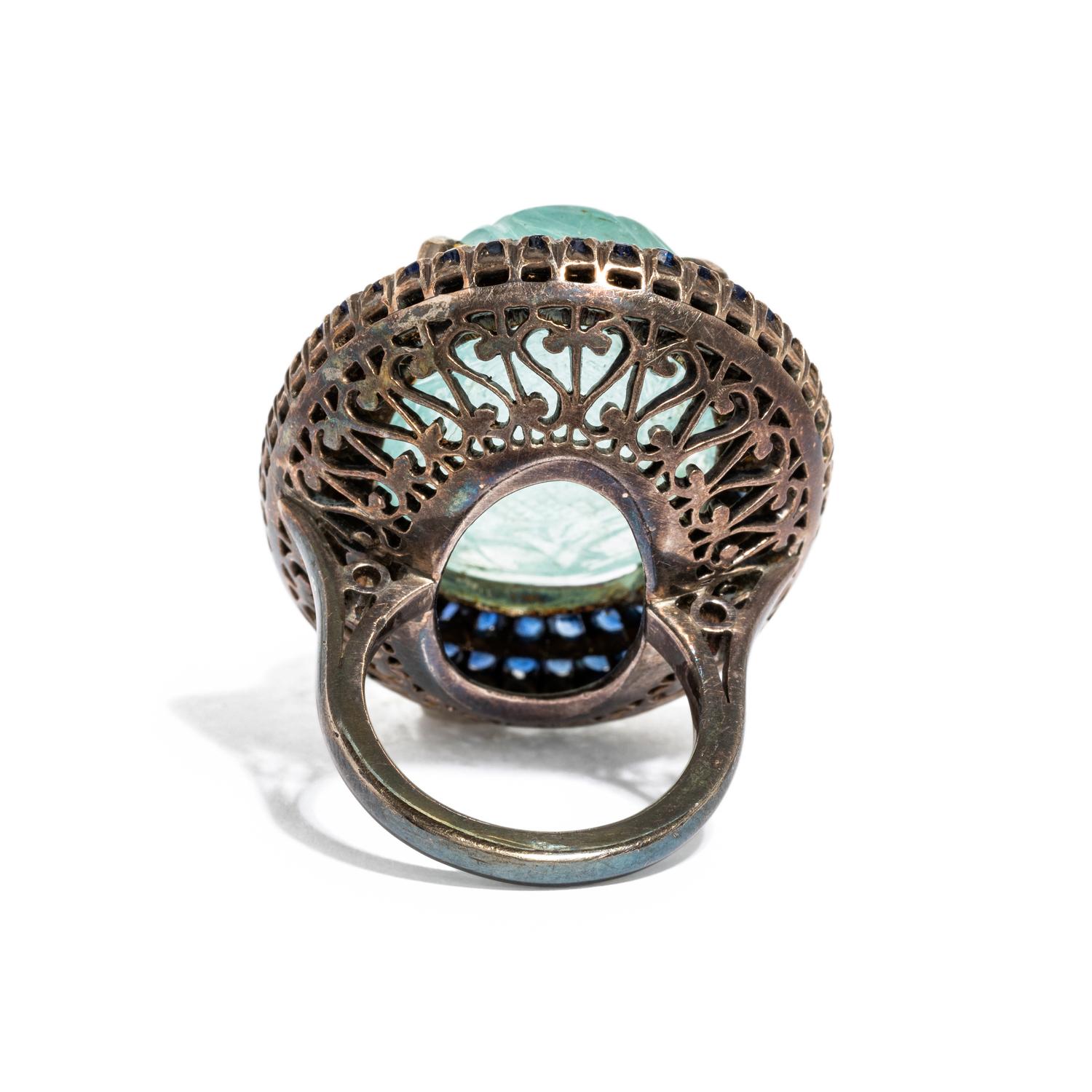 CARVED AQUAMARINE AND SAPPHIRE RING