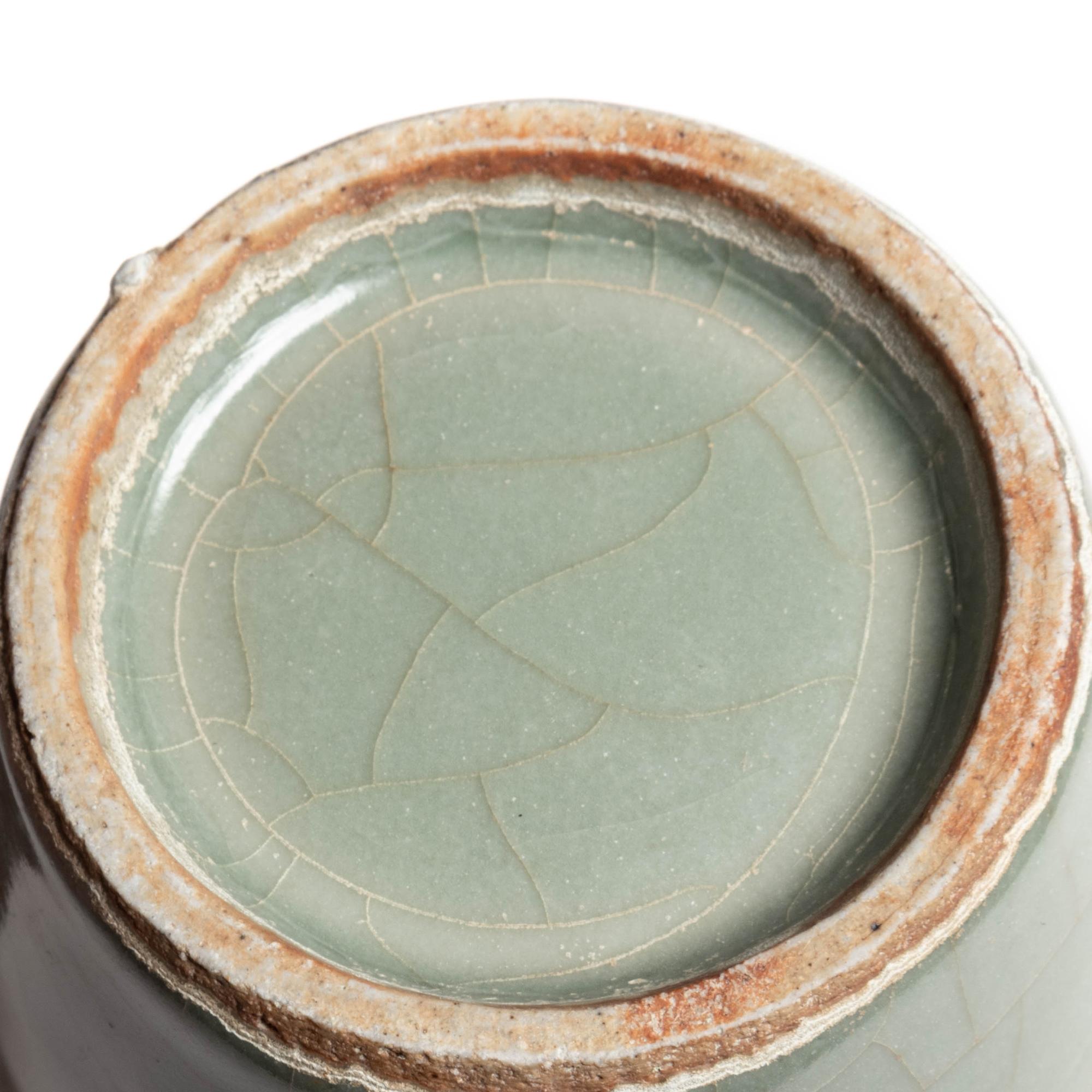 A Chinese Celadon Glazed Porcelain Double Handled Vase