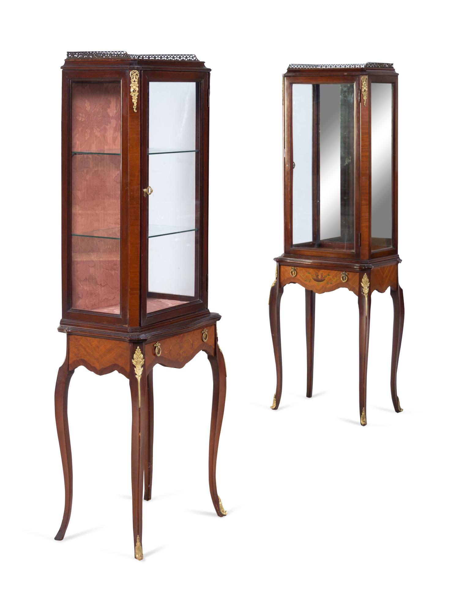 A Near Pair of Louis XV/XVI Transitional Style Gilt Metal Mounted Vitrines