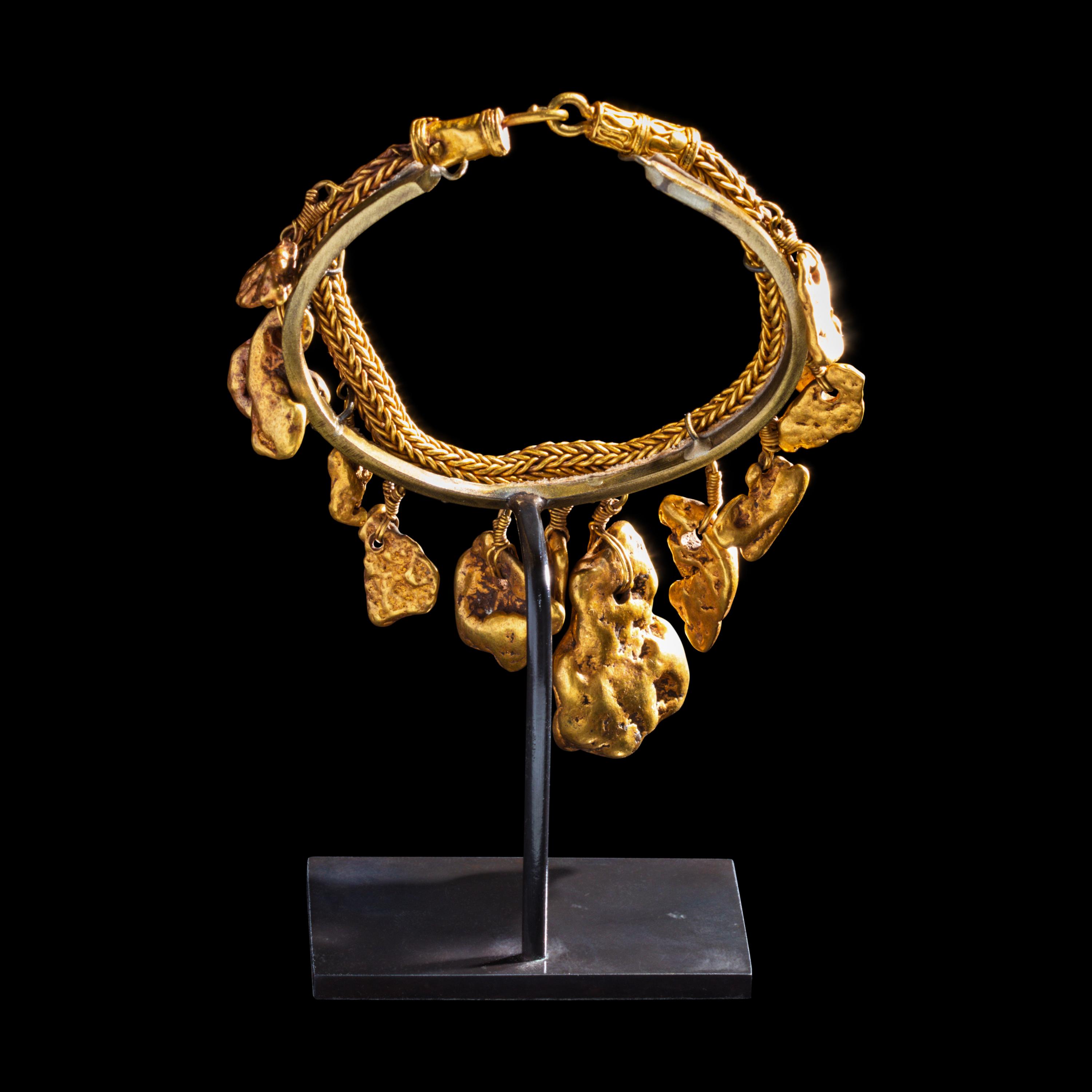 A Greek Gold Bracelet with Nugget Pendants