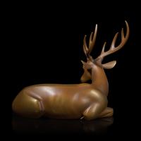 A Japanese Patinated Bronze Figure of a Recumbent Deer, Showa Period