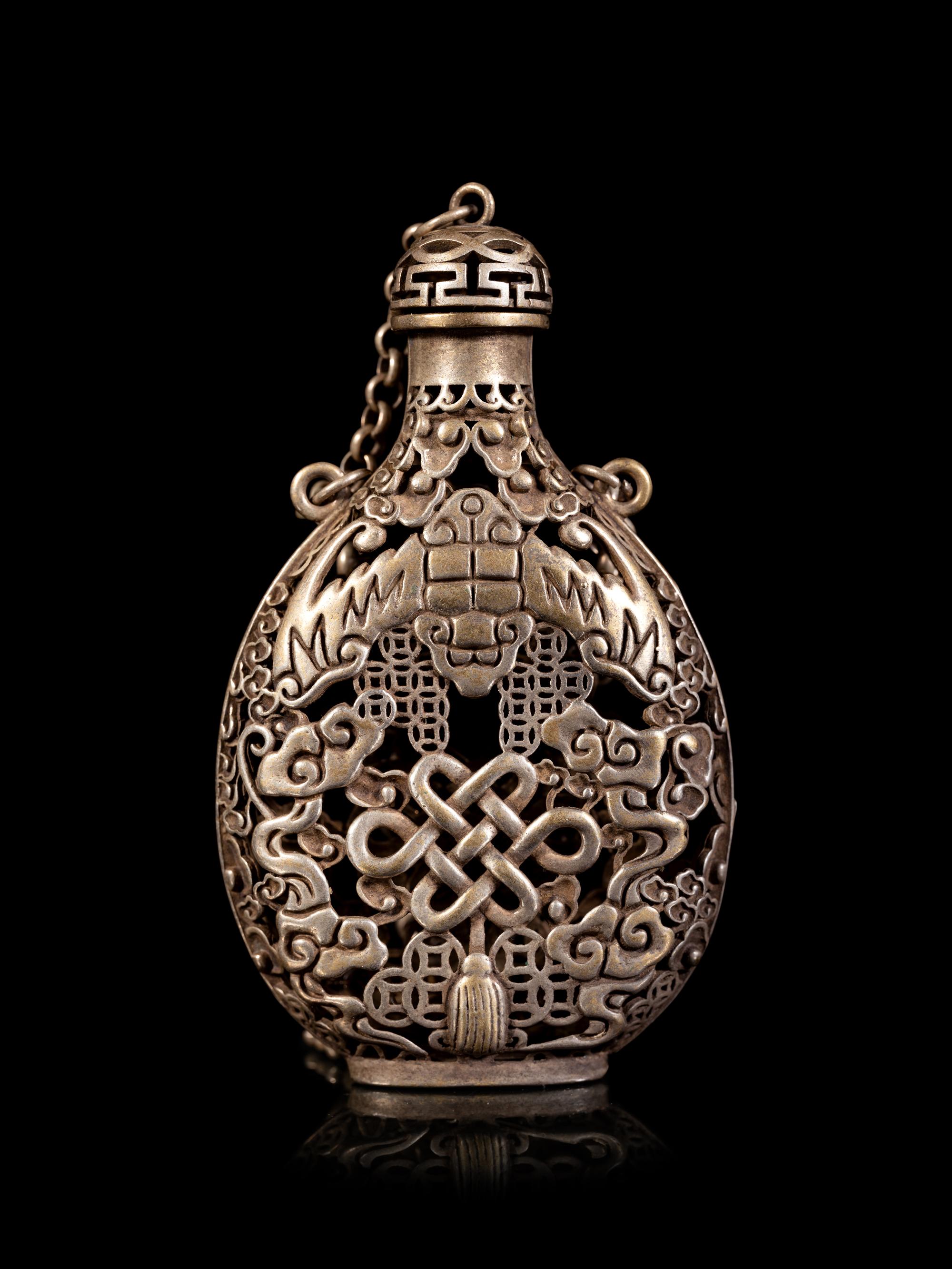 A Chinese Reticulated Silver Snuff Bottle