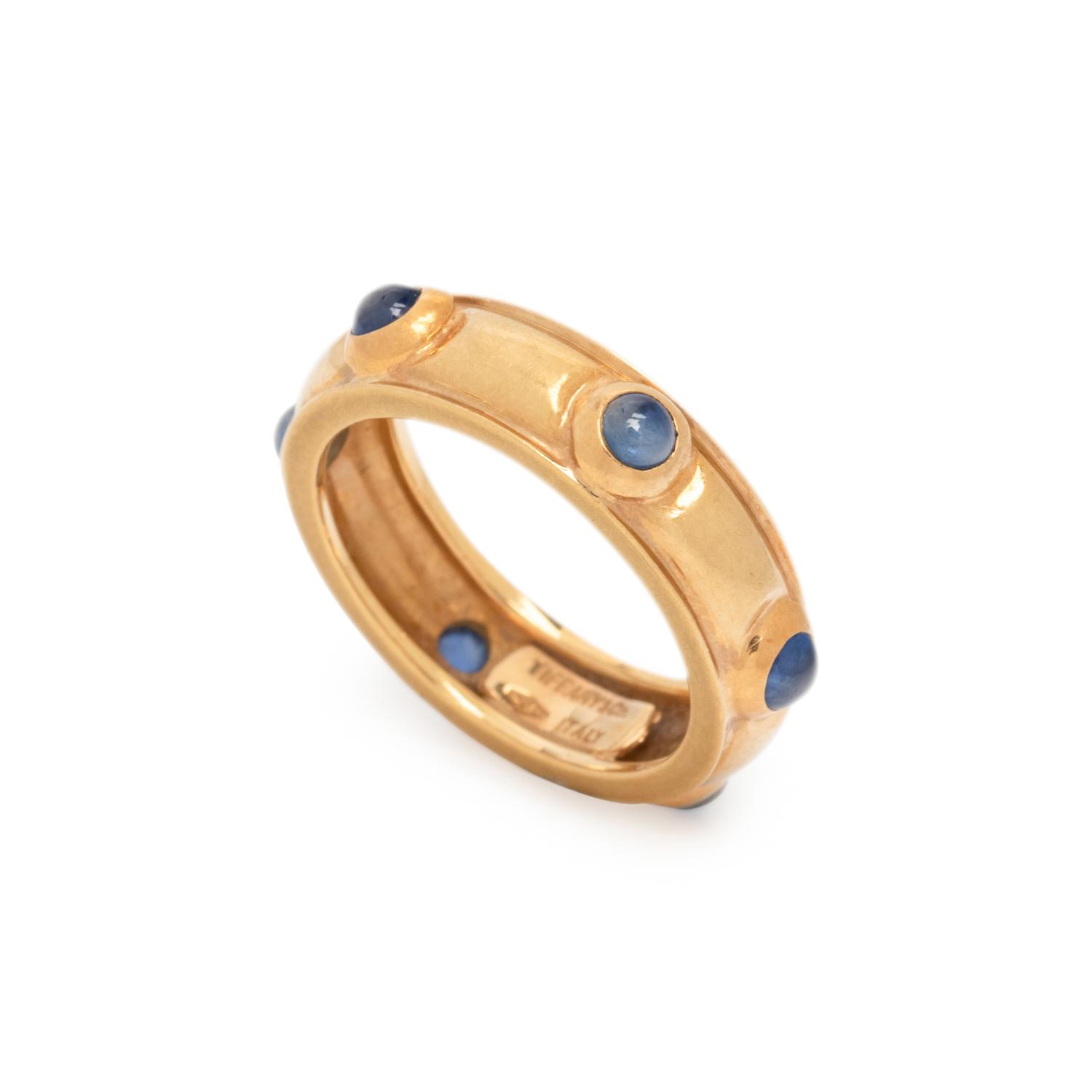 TIFFANY & CO., YELLOW GOLD AND SAPPHIRE RING AND BANGLE BRACELET