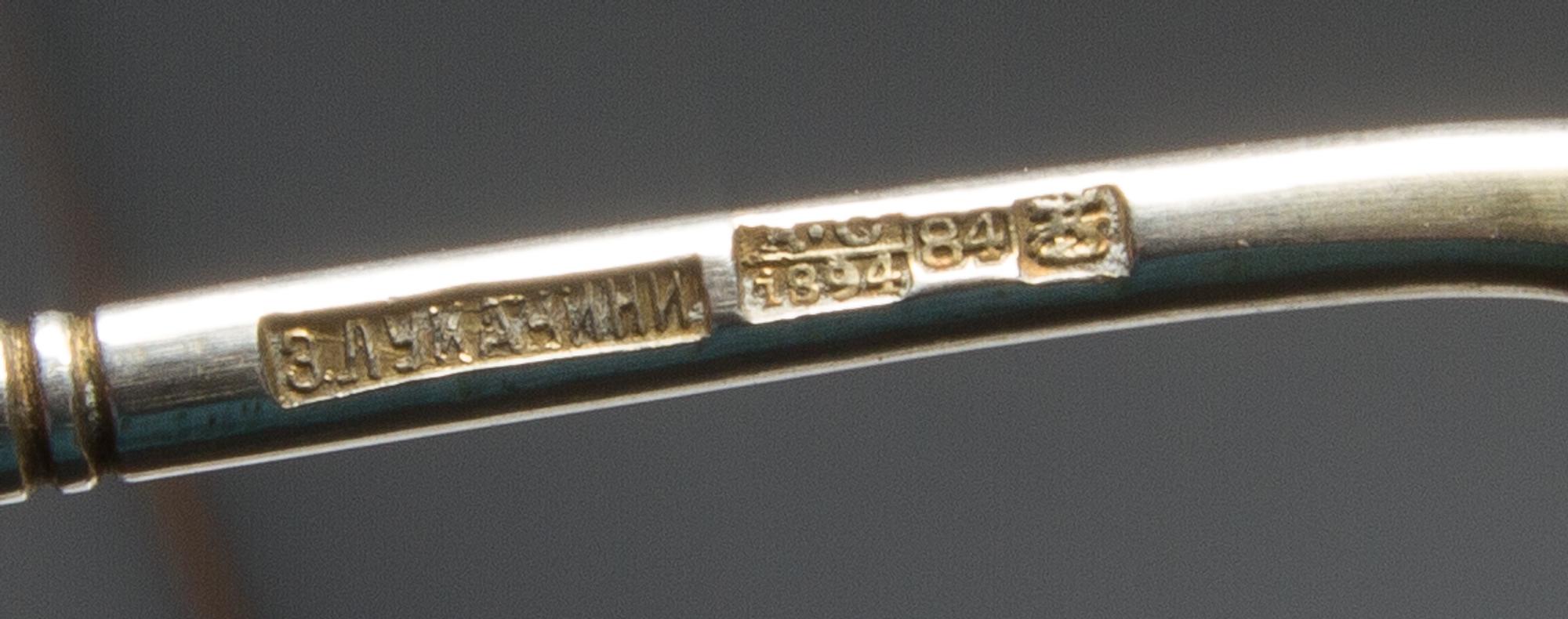 Two Russian Niello Silver Spoons, Mark of Z. Lukachini, assay mark of Aleksandr Skvronsky, Moscow, 1894, each having a twist stem, the