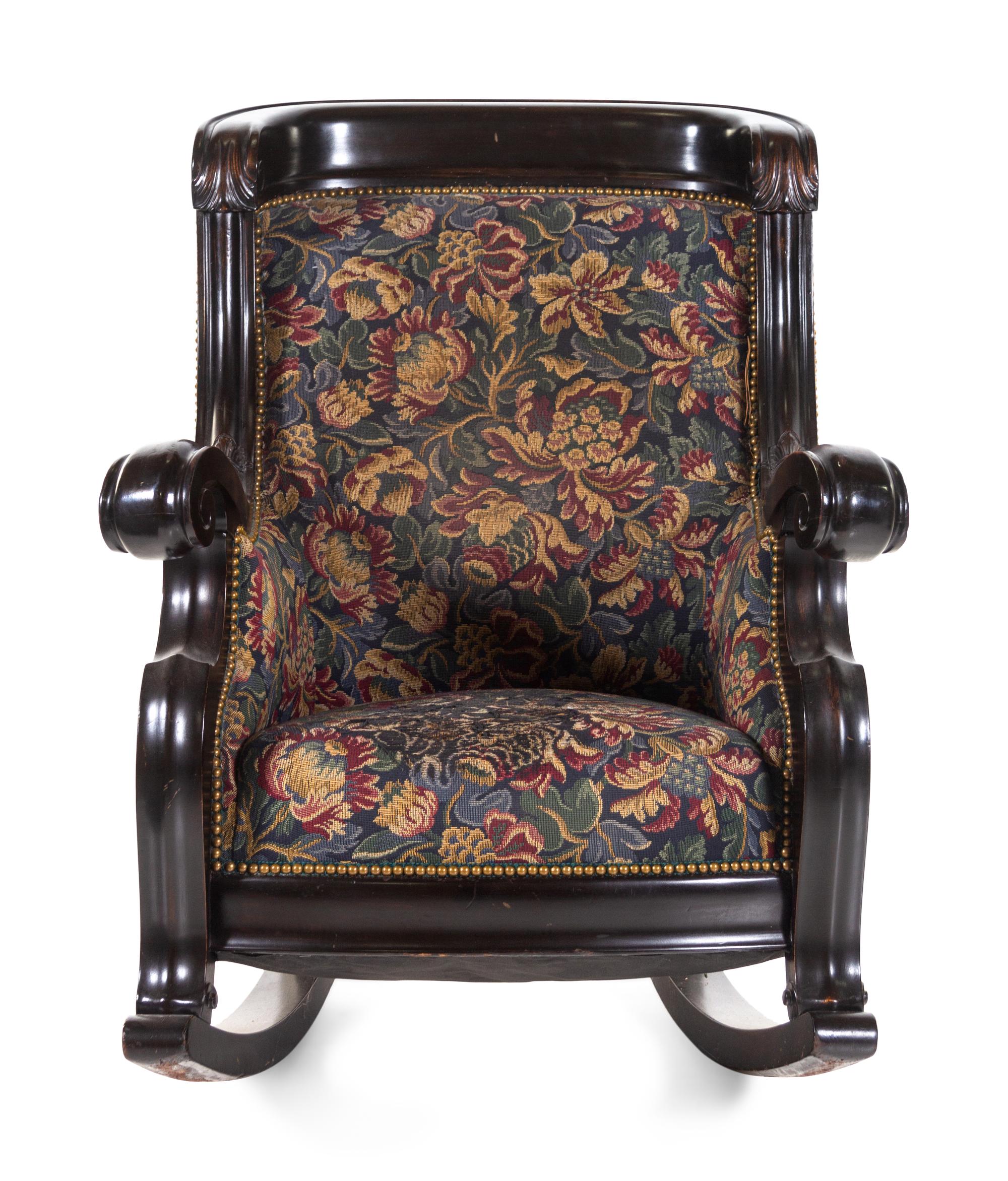 A Karpen Carved Mahogany Rocker