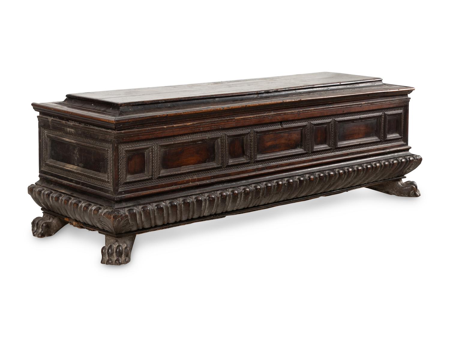 An Italian Carved Walnut Cassone