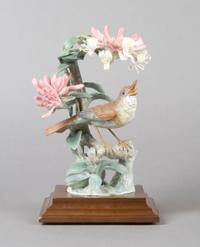 A Royal Worcester Dorothy Doughty Bird, Nightingale, Height 10 1/2 inches.