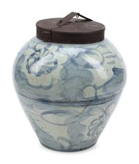 A Korean Iron-Mounted Porcelain Tea Jar