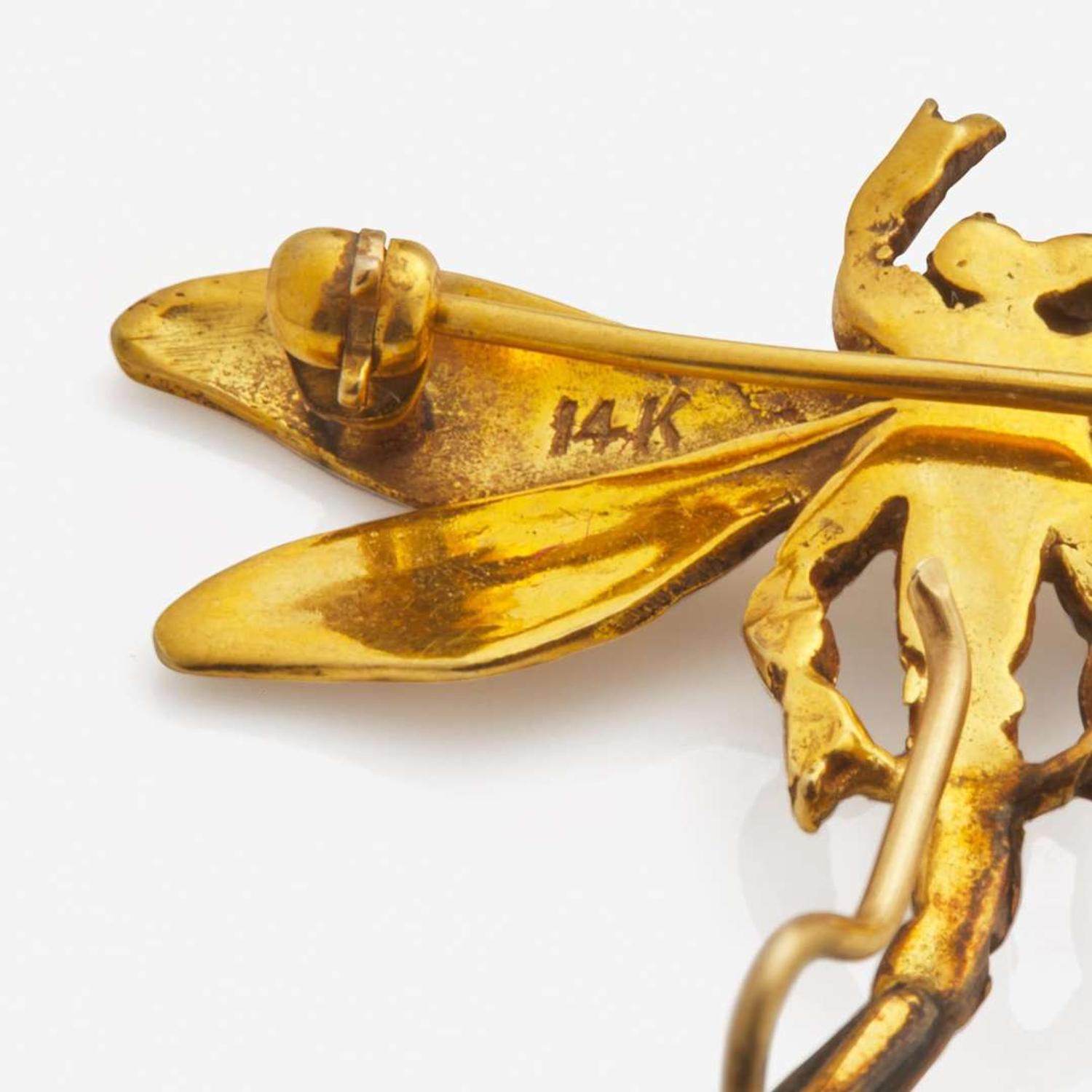 A Collection of Three 14K Yellow Gold Pins