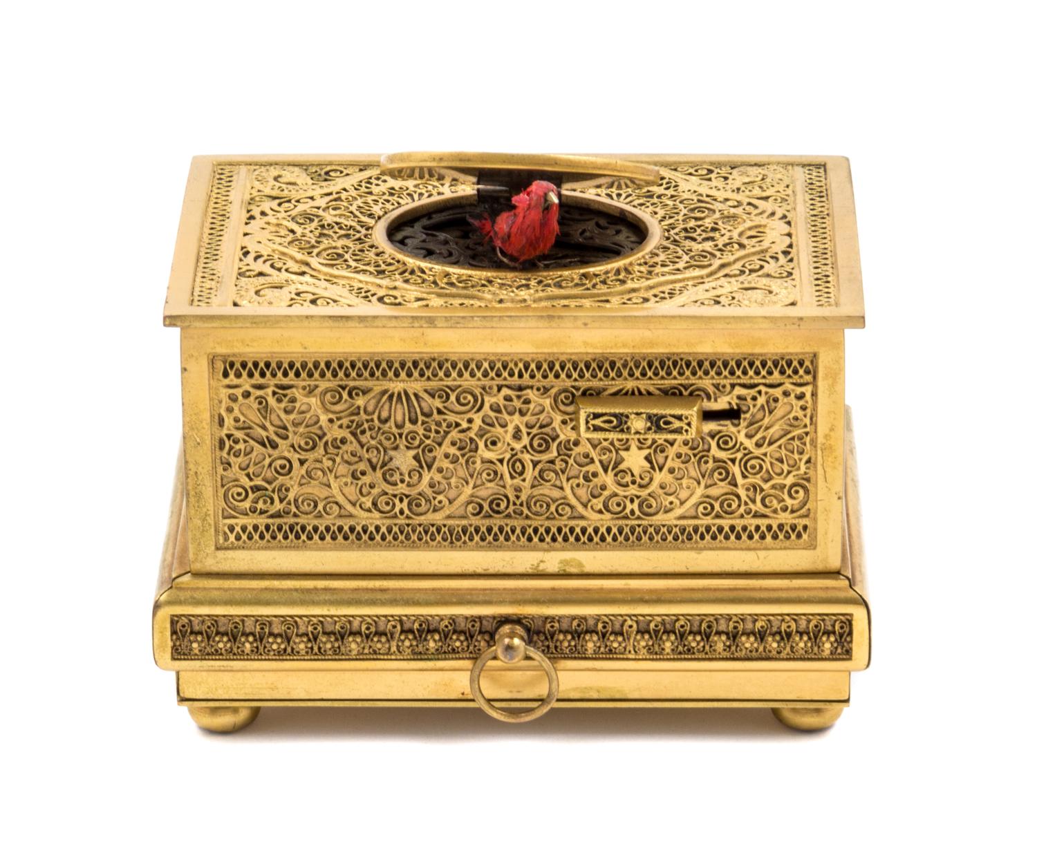 A German Gilt Filigree Singing Bird Automaton Box Width 4 1/2 inches.