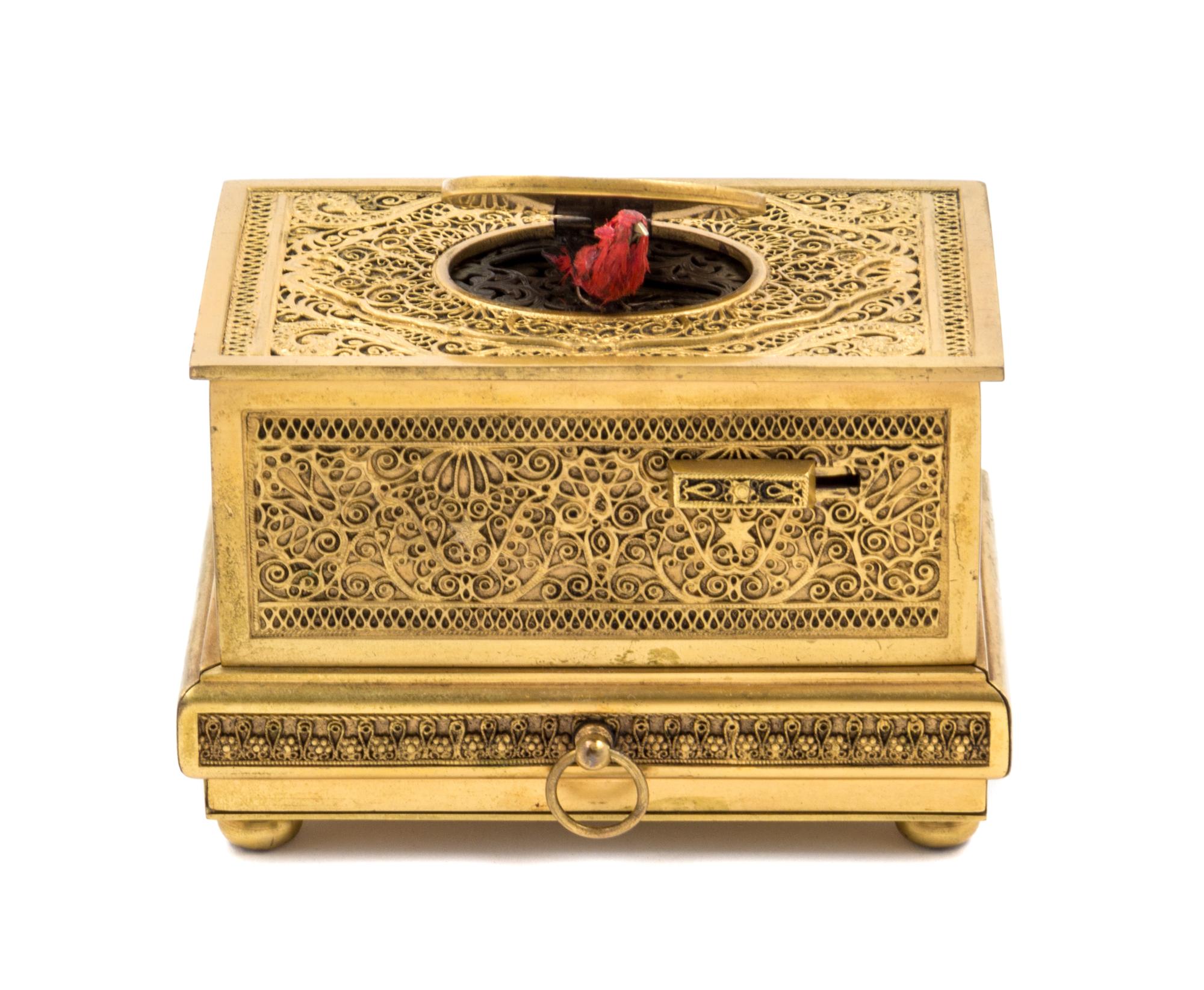 A German Gilt Filigree Singing Bird Automaton Box Width 4 1/2 inches.