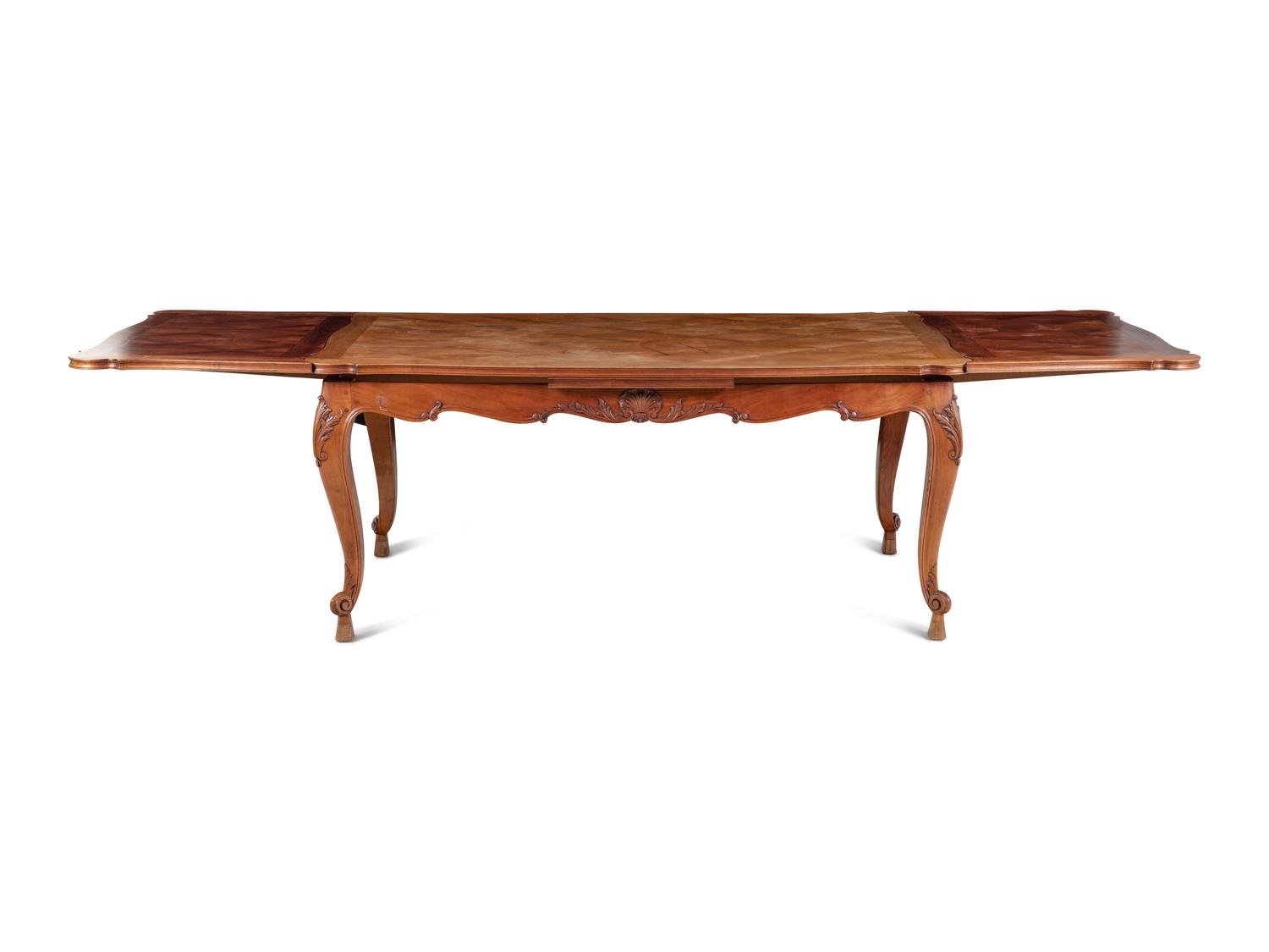 A Louis XV Style Parquetry and Walnut Extension Dining Table